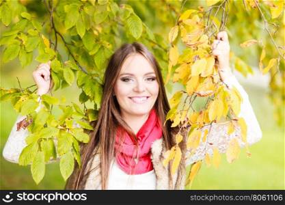 Fall lifestyle concept, harmony freedom. Attractive young woman fashion girl long hair relaxing walking in autumnal park, outdoor