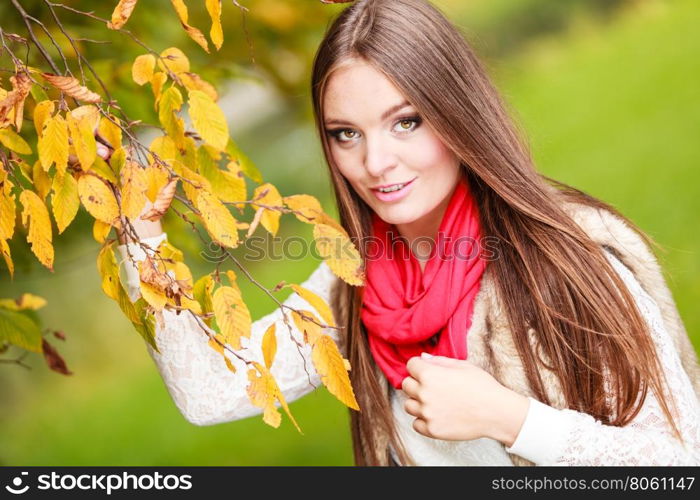 Fall lifestyle concept, harmony freedom. Attractive young woman fashion girl long hair relaxing walking in autumnal park, outdoor