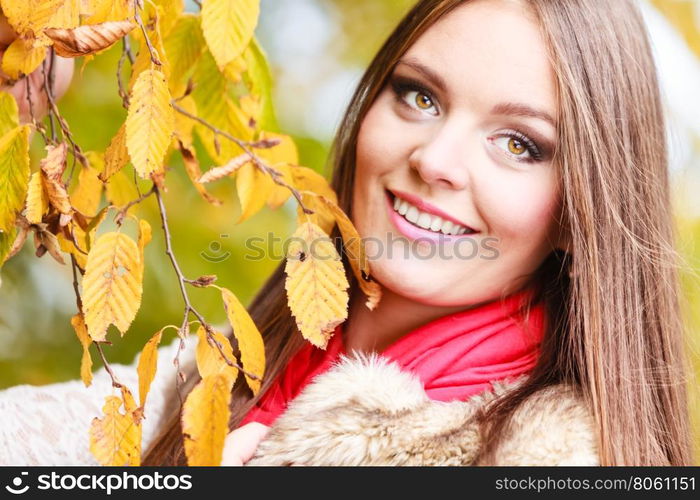 Fall lifestyle concept, harmony freedom. Attractive young woman fashion girl long hair relaxing walking in autumnal park, outdoor