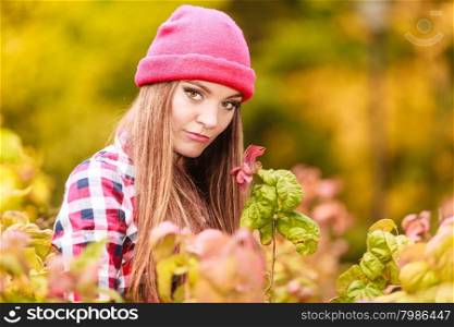 Fall lifestyle concept, harmony freedom. Beauty young woman fashion girl casual style relaxing walking in autumnal park, outdoor