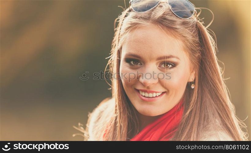 Fall lifestyle concept, harmony freedom. Beauty young woman fashion girl in sunglasses relaxing walking in autumnal park, outdoor