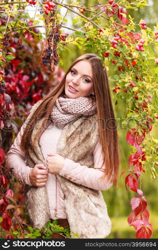 Fall lifestyle concept, harmony freedom. Beauty young woman fashion girl relaxing walking in autumnal park, outdoor