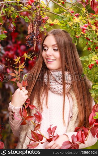 Fall lifestyle concept, harmony freedom. Beauty young woman fashion girl relaxing walking in autumnal park, outdoor