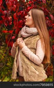 Fall lifestyle concept, harmony freedom. Beauty young woman fashion girl relaxing walking in autumnal park, outdoor