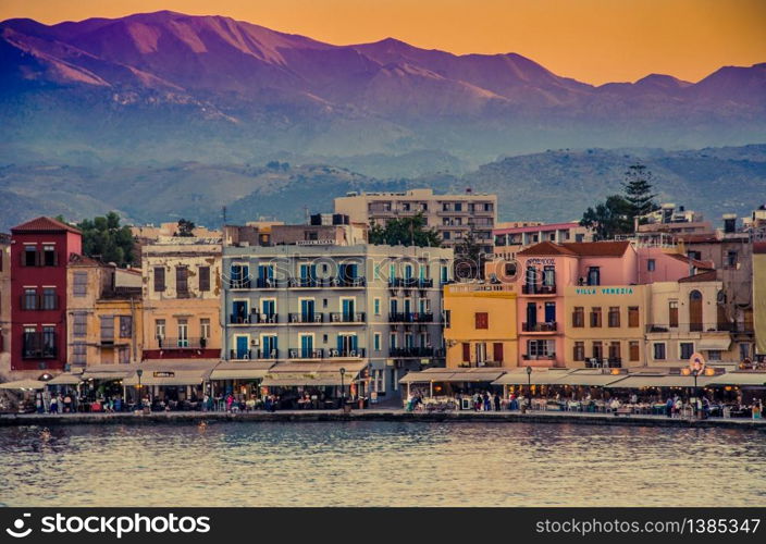 Fall of sun in the venecian port of xavia jania chania . crete island. greece