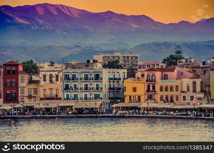 Fall of sun in the venecian port of xavia jania chania . crete island. greece