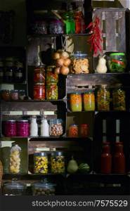 Fall Pantry with Jars And Pickled Vegetables