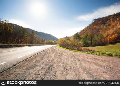 Fall road between the mountains in Carpathians. The Fall road