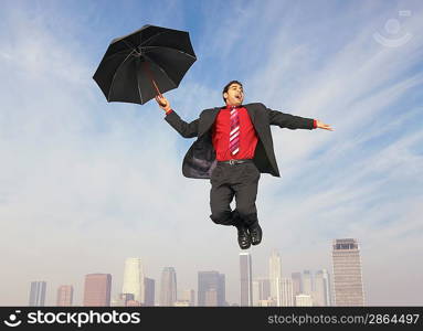 Falling Businessman with Umbrella