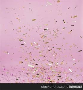 falling golden confetti pink background. Resolution and high quality beautiful photo. falling golden confetti pink background. High quality beautiful photo concept