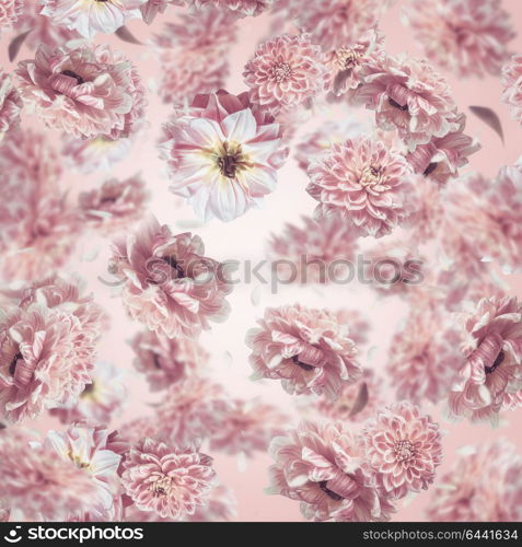 Falling or flying pastel pink flowers background or pattern