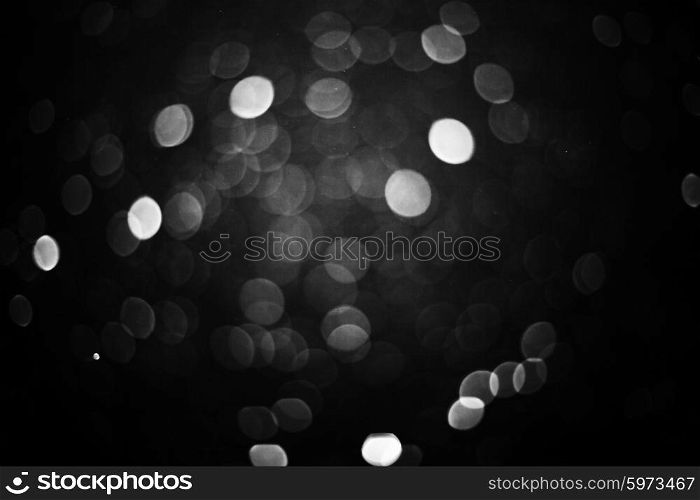 Falling snow background - snowflakes over night dark sky. Snow background