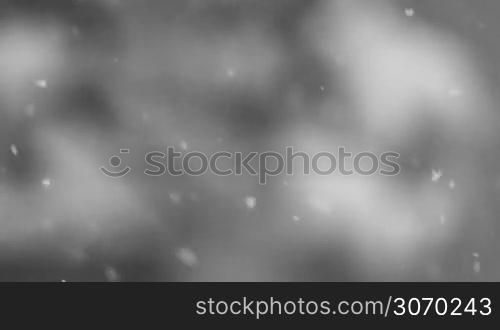 falling snow creates a winter background