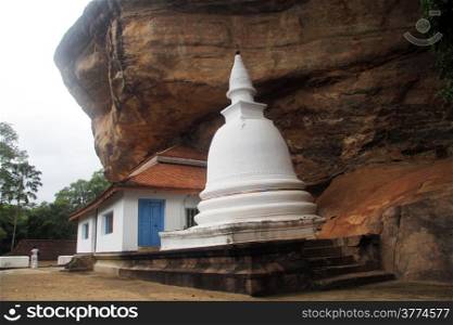 Falling stupa an d temple Ridigala in Sri Lanka