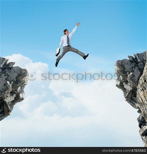 False risk for your business. Concept of false danger with businessman jumping above gap