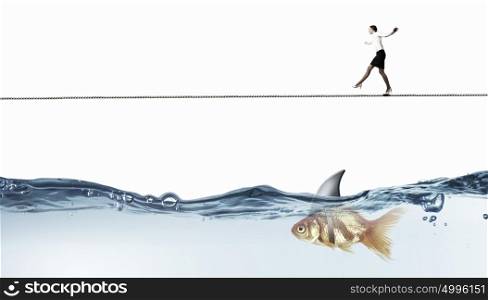 False risk for your business. Concept of false danger with businesswoman walking on rope above water