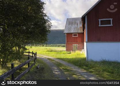 Falured painted farmbuilding near Lesja in the Norwegian region Gudbrandsdalen. Falured shed in Norway