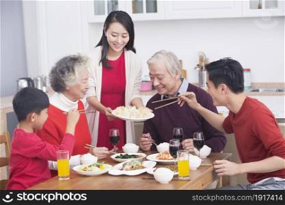 Families having a reunion dinner on New Year's Day