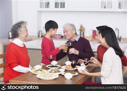Families having a reunion dinner on New Year's Day