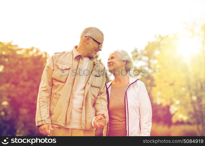 family, age, tourism, travel and people concept - senior couple in park. senior couple in park. senior couple in park