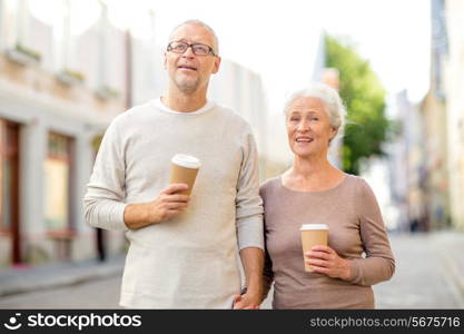 family, age, tourism, travel and people concept - senior couple on city street