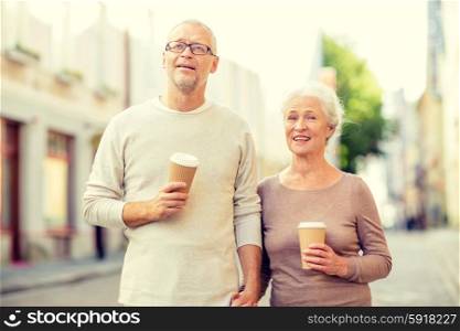 family, age, tourism, travel and people concept - senior couple on city street
