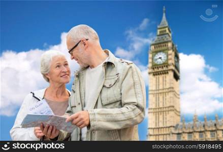 family, age, tourism, travel and people concept - senior couple with map over big ben tower in london city background