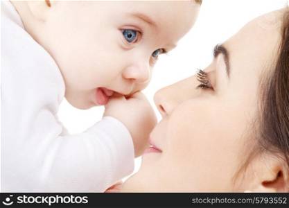 family and happy people concept - baby and mother