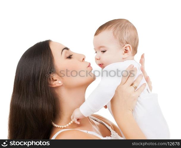 family and motherhood - happy mother kissing her child