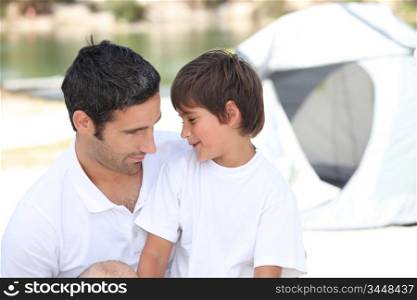 Family and son camping together