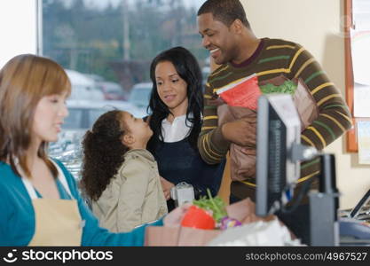 family at a till