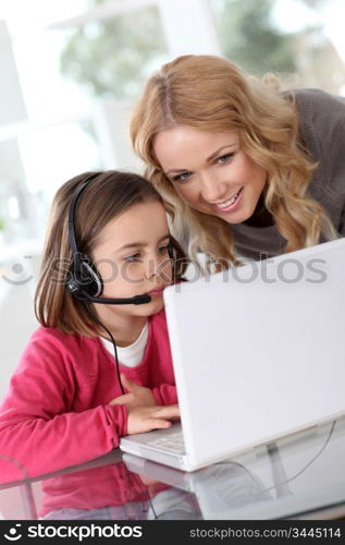 Family at home using computer webcamera
