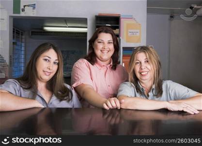 Family business portrait of mother and daughters