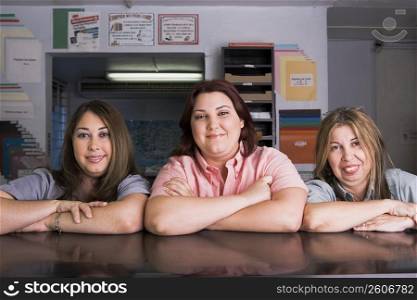 Family business portrait of mother and daughters