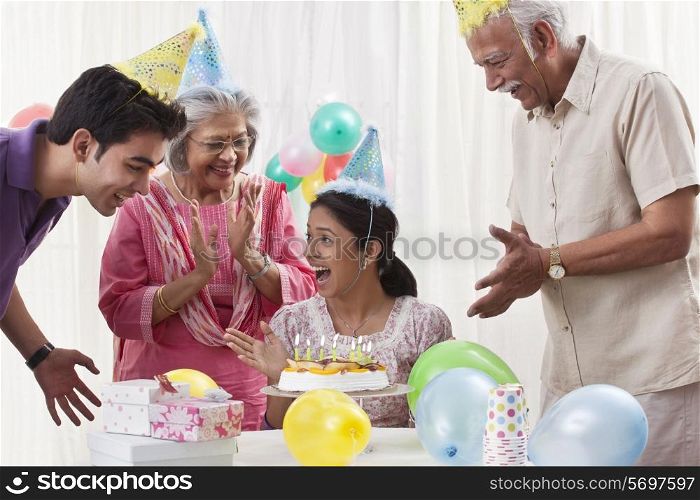 Family celebrating birthday