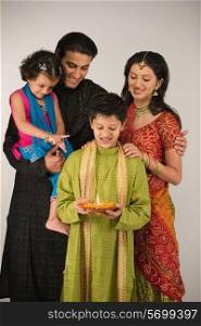 Family celebrating diwali
