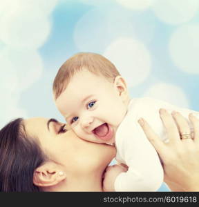 family, child and happiness concept - happy mother with baby