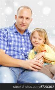 family, child and happiness concept - smiling father and daughter with teddy bear toy at home