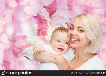 family, child and parenthood concept - happy mother with smiling baby