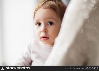 family, childhood and people concept - close up of sweet little baby girl with mother. close up of sweet little baby girl with mother