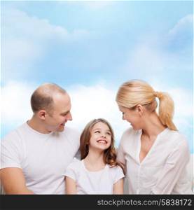 family, childhood and people - smiling mother, father and little girl over blue sky background