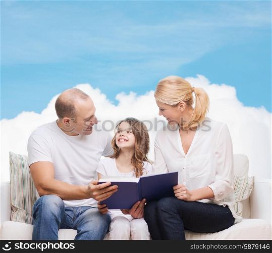 family, childhood, dream and people - smiling mother, father and little girl reading book over blue sky and cloud background