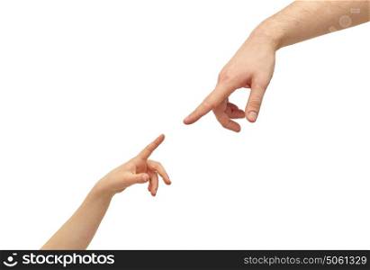 family, childhood, fatherhood and people concept - happy father and child holding hands pointing fingers to each other. happy father and child hands pointing fingers
