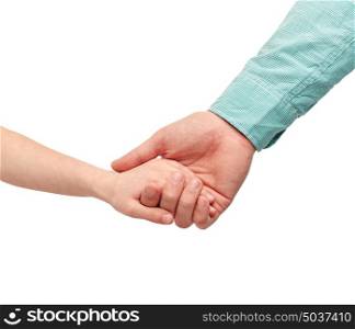 family, childhood, fatherhood and people concept - happy father and child holding hands. happy father and child holding hands