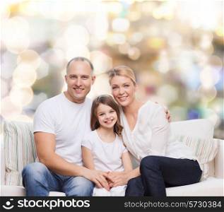 family, childhood, holidays and people concept - smiling mother, father and little girl over lights background