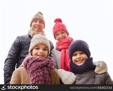 family, childhood, season and people concept - happy family outdoors