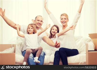 family, children, accomodation and home concept - smiling parents and two little girls waving hands at new home