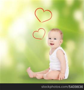 family, children and happiness concept - adorable smiling baby