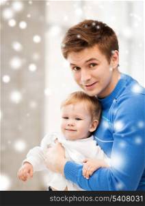 family, children, christmas, x-mas, love concept - happy father with adorable baby