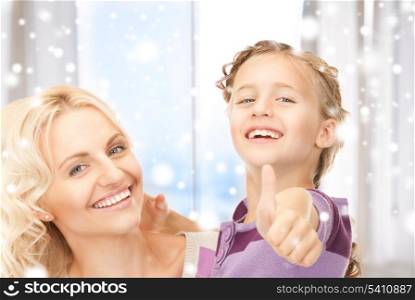 family, children, christmas, x-mas, love concept - happy mother and child (focus on girl)